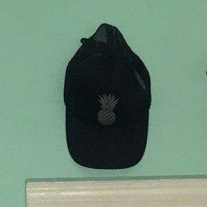 black hat with silver pineapple